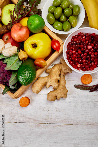 Superfoods Healthy food  on white background. Vegan diet selection. Nuts  berries  fruits  and legumes.  Top view. Free copy space.