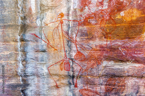 Ancient Aboriginal Art: hand prints, animal herds, spiral, Kakadu National Park, Australia