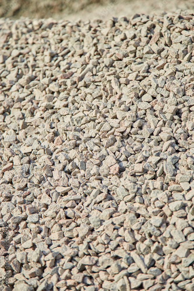 Breakstone background, a pile of crushed stone. Road gravel, gravel texture. Piles of limestone rocks. Break stones on construction site. Breakstone background, a pile of crushed stone. Road gravel, gravel texture. Piles of limestone rocks. Break stones on construction site.