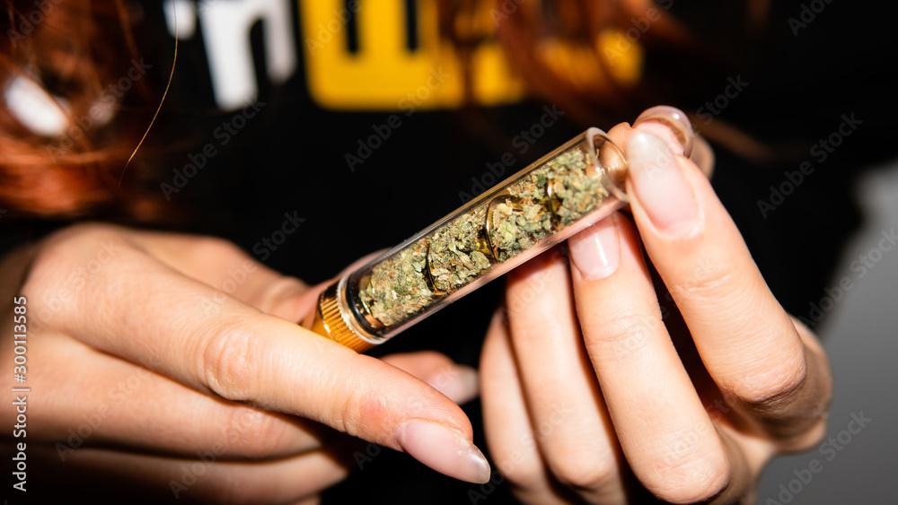 Fototapeta premium The benefits of smoking marijuana for women's health. New scientific research in recreational marijuana