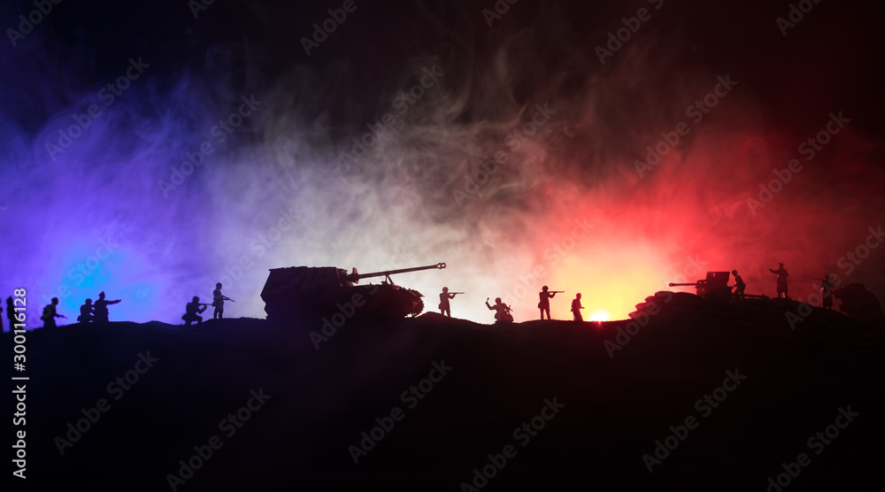 War Concept. Military silhouettes fighting scene on war fog sky background, World War German Tanks Silhouettes Below Cloudy Skyline At night. Attack scene. Armored vehicles and infantry. War Concept. Military silhouettes fighting scene on war fog sky background, World War German Tanks Silhouettes Below Cloudy Skyline At night. Attack scene. Armored vehicles and infantry.