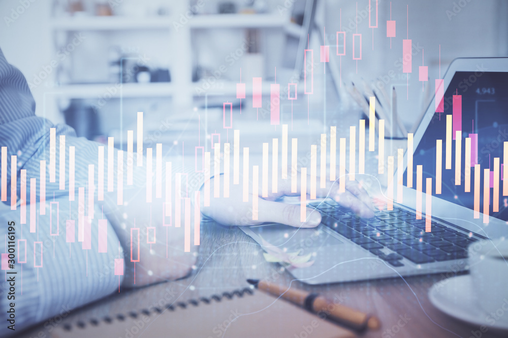 Multi exposure of stock market chart with man working on computer on background. Concept of financial analysis. Multi exposure of stock market chart with man working on computer on background. Concept of financial analysis.