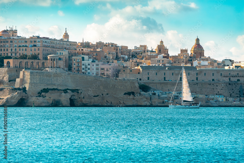 Valletta panoramic view and from sea and yacht with sail