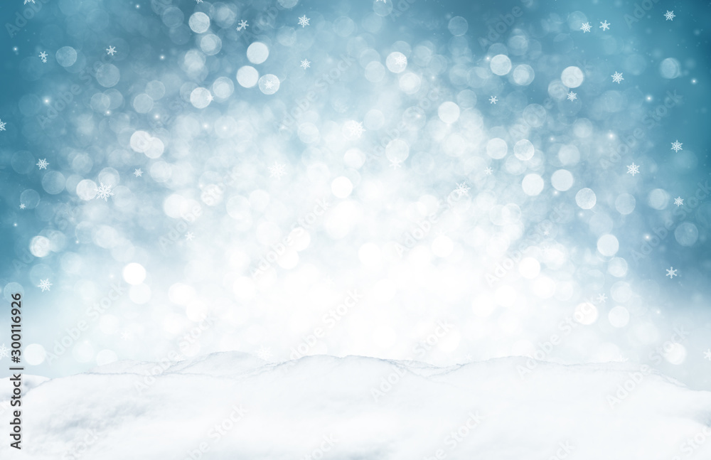 Fototapeta premium Dekoracyjne tło Boże Narodzenie z bokeh świateł i płatki śniegu.