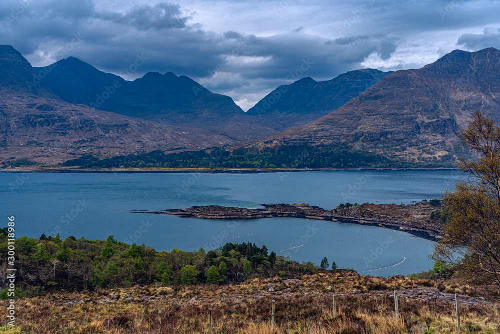 lake fence mountains dark clouds scotland outdoor