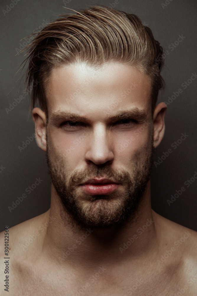 Handsome sport sexy stripped guy portrait for cosmetics on isolated gray background with fields Handsome sport sexy stripped guy portrait for cosmetics on isolated gray background with fields