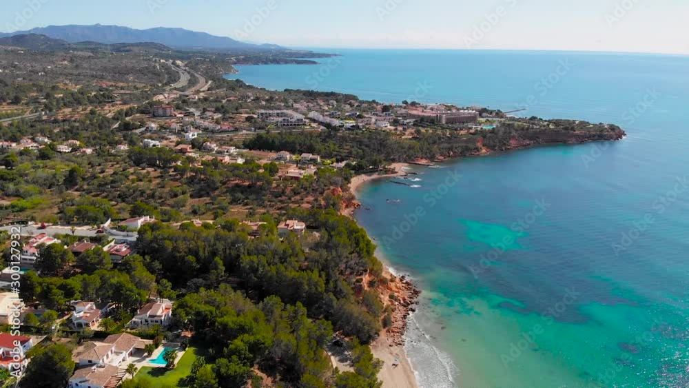 Flying above Cap Roig beach in Catalonia near L'Ampolla. Drone aerial footage Flying above Cap Roig beach in Catalonia near L'Ampolla. Drone aerial footage