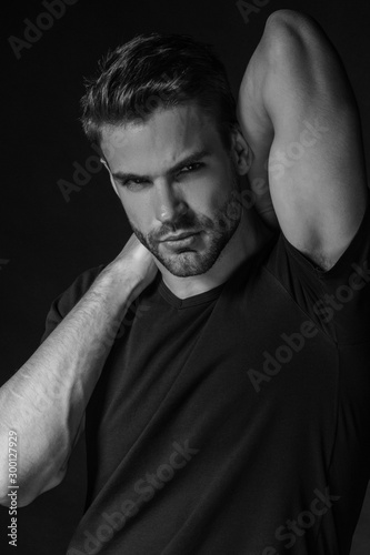 Fototapeta Black and White Muscle strong beautiful stripped male model in casual cloath on