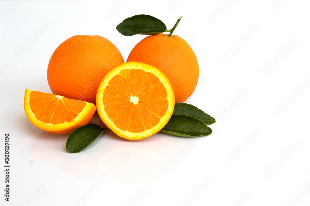 oranges with leaves isolated on white background oranges with leaves isolated on white background