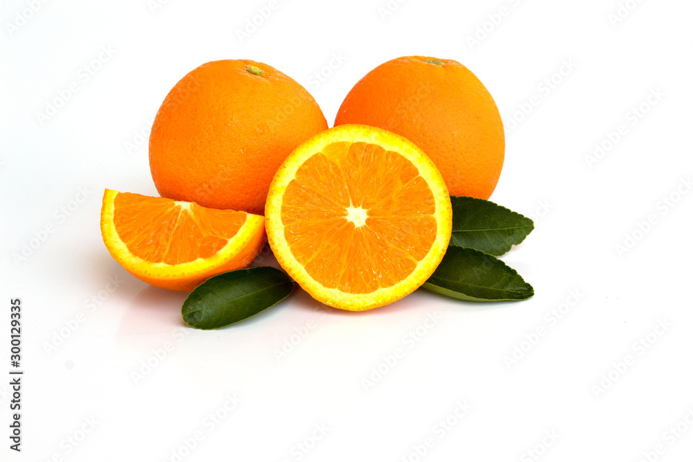 oranges with leaves isolated on white background