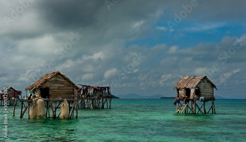 Fototapeta Naklejka Na Ścianę i Meble -  Malaysia. A Gypsy fishing village on one of the many islets on the East coast of Borneo.