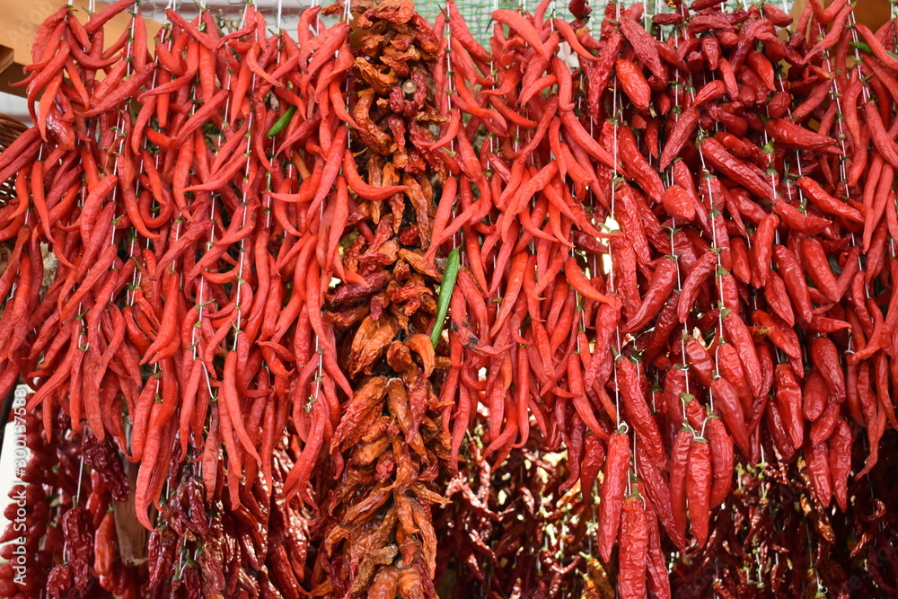 Fototapeta premium Closeup of red chilis on a local market in Funchal in Madeira, Portugal