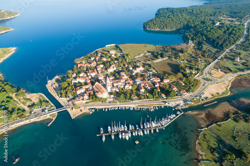 Aerial view of Osor ( Ossero ) is a small town and port on the Cres island in Croatia. It is lies at a narrow channel that separates islands Cres and Lošinj.  photo