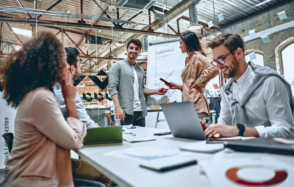 © Vasyl - Young business people in office © Vasyl - Young business people in office