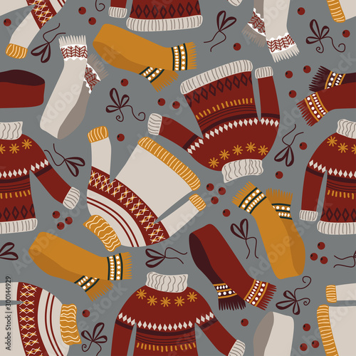 winter seamless pattern with sweaters and scarves - vector illustration, eps