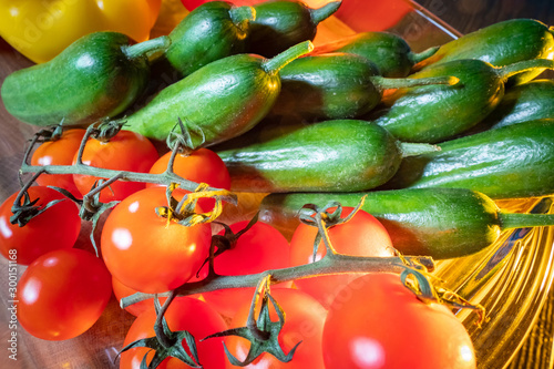 Cucumbers and tomatoes clos...
