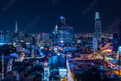 Cityscape of Ho Chi Minh City, Vietnam at night photo