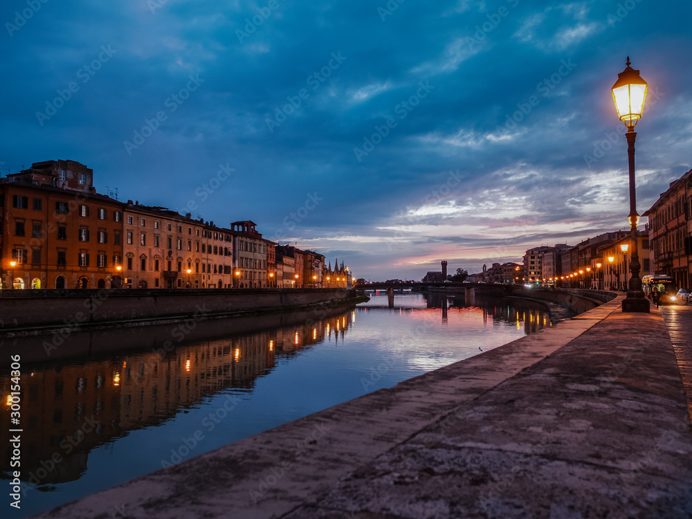 Lungarnos in Pisa Italy, as well as Florence, is crossed by the Arno river. Pisan lungarnos, adorned with wonderful buildings and bridges are the most picturesque and famous places in Pisa