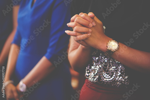 People praying together at Church.
