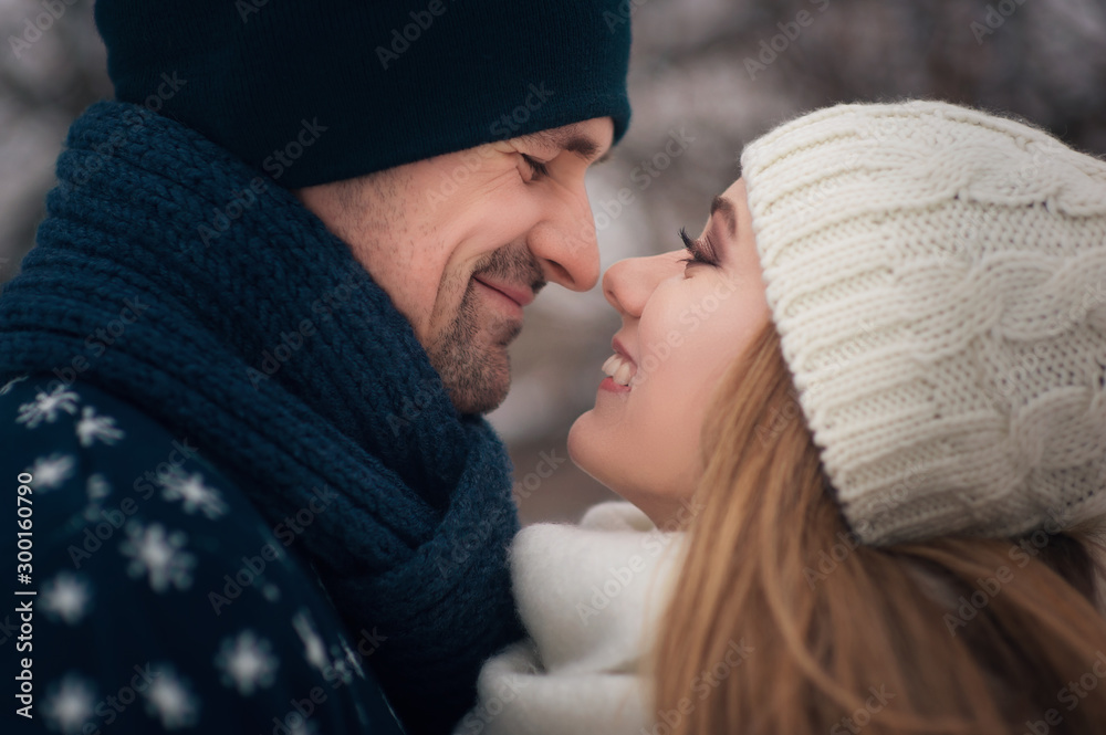 Young lovers couple hug each other dr winter walk in the park Young lovers couple hug each other dr winter walk in the park