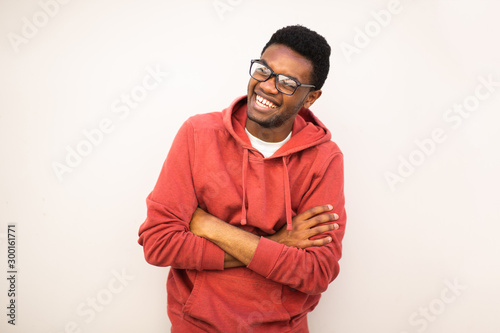 happy black guy laughing with glasses against white background