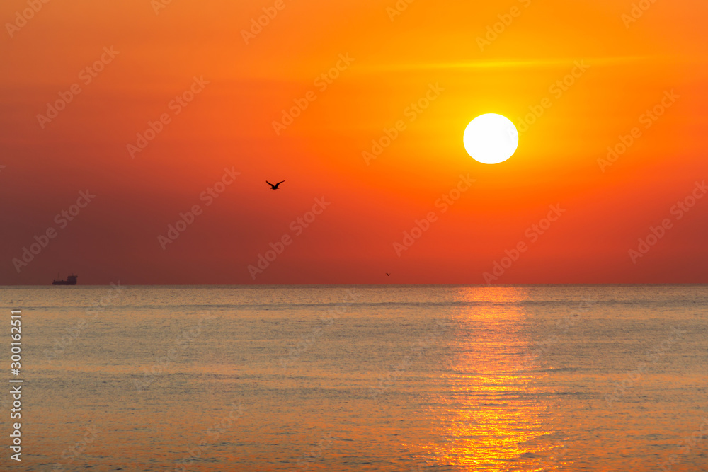 Picturesque orange sunrise over the sea. Black Sea, Bulgaria
