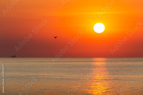 Picturesque orange sunrise over the sea. Black Sea, Bulgaria