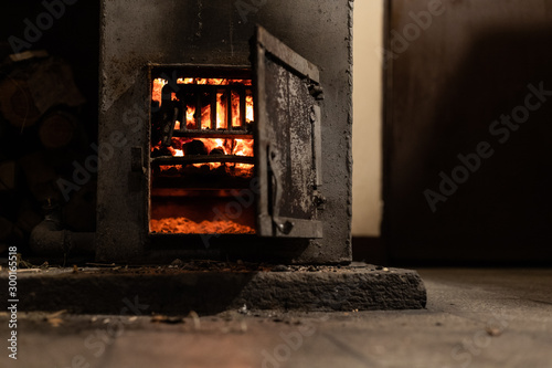 Fotografie, Obraz View on the coal burning in the stove in basement