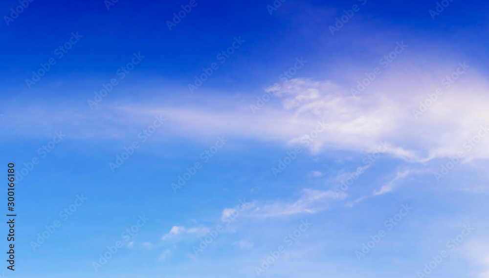 Air clouds in the blue sky.Blue backdrop in the air. Abstract style for text, design, fashion, agencies, websites, bloggers, publications, online marketers, brand, pattern, model, animation,