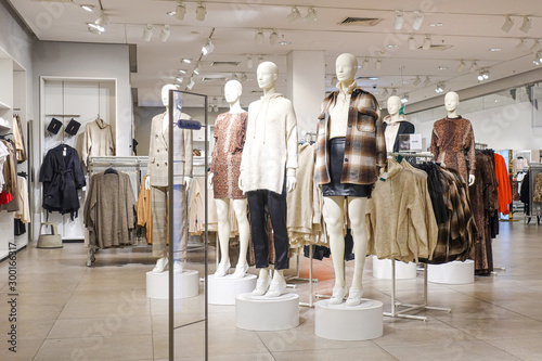 Modern fashionable brand interior of clothing store inside shopping center