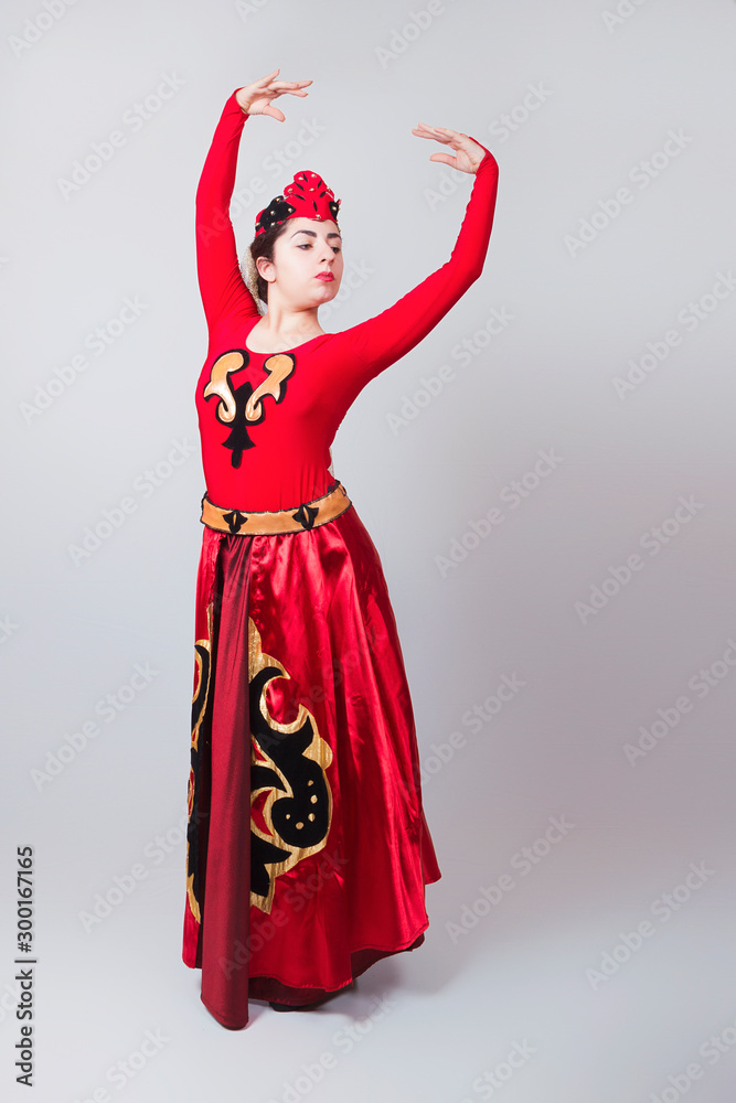 Dancing Armenian girl in a red dress