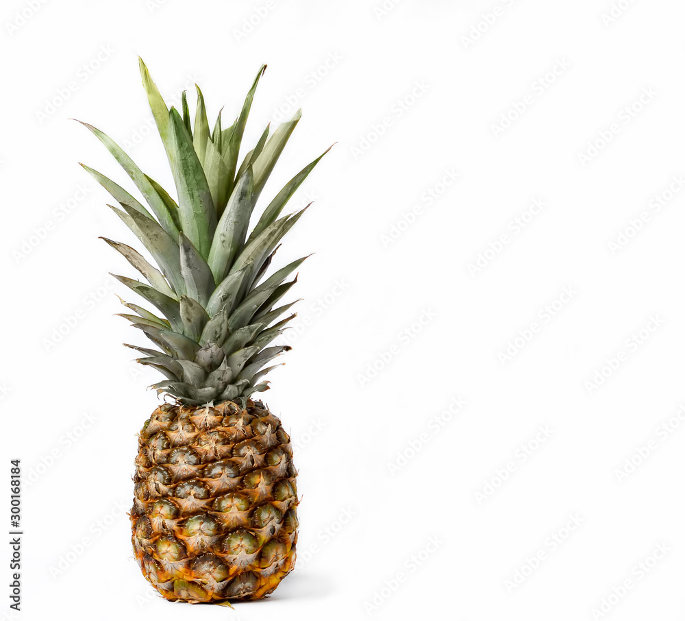 ripe pineapple on a white isolated background ripe pineapple on a white isolated background