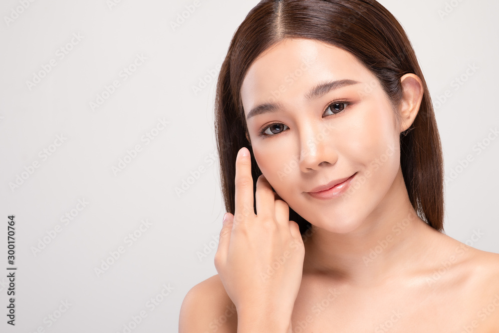 Beautiful Asian young woman touching soft cheek smile with clean and fresh skin Happiness and cheerful with positive emotional,isolated on white background,Beauty and Cosmetics Concept Beautiful Asian young woman touching soft cheek smile with clean and fresh skin Happiness and cheerful with positive emotional,isolated on white background,Beauty and Cosmetics Concept