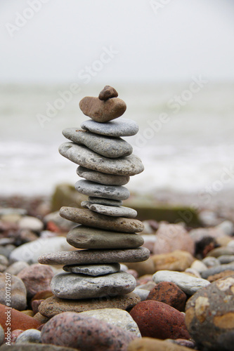 stack of pebbles on the beach closeup