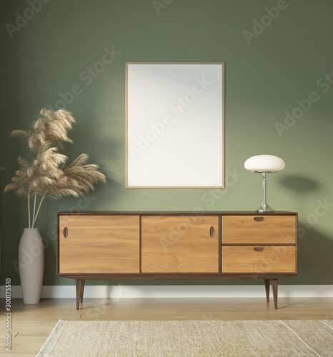 Fototapeta Naklejka Na Ścianę i Meble -  Contemporary green interior with frame and mid century buffet