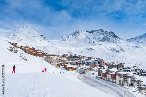 Skiers against Val Thorens and Mountains with lot of snow.