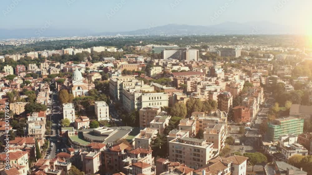Aerial view of Rome Italy residential areas with houses, flight on drone above city buildings in sunny day Aerial view of Rome Italy residential areas with houses, flight on drone above city buildings in sunny day