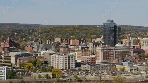 Worcester Massachusetts Aerial v10 Panning around downtown cityscape with parking lot and boulevard traffic - October 2017