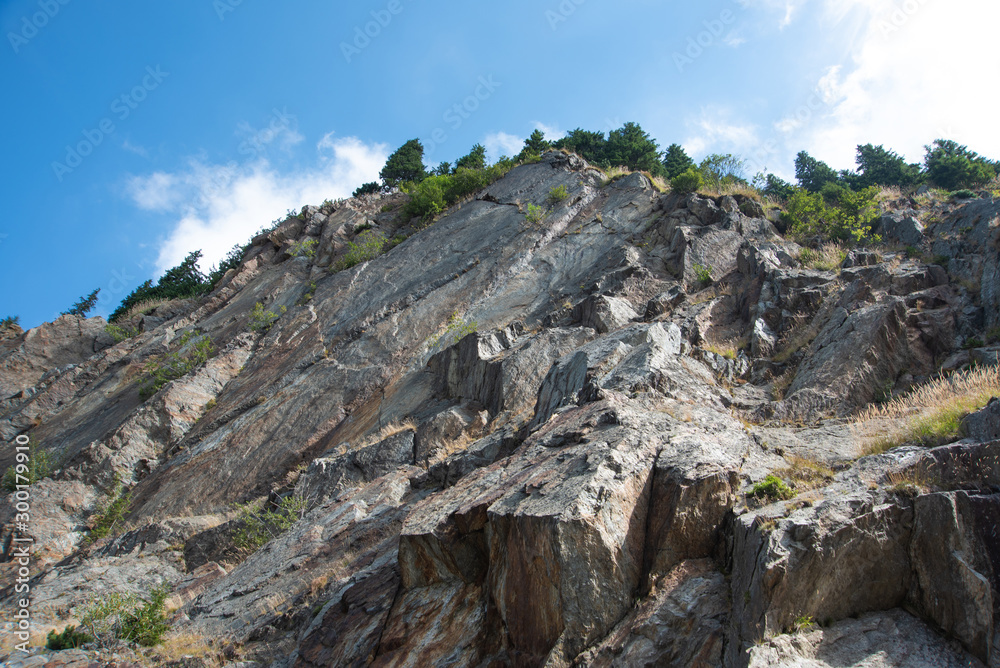 Rocky hills and blue sky. Beautiful mountain landscape