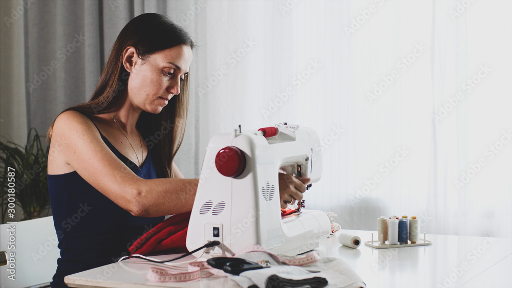 people sewing clothes