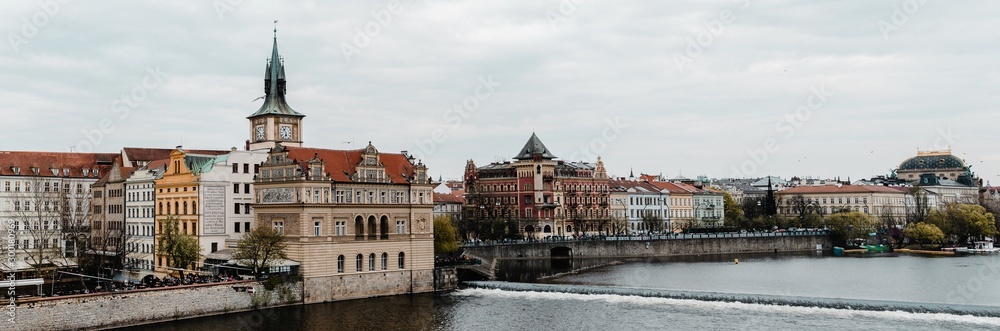 view of castle and charles bridge in prague