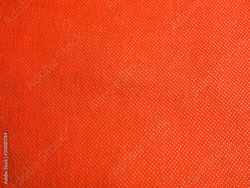 Abstract gradient background of rough vivid or vibrant red paper pattern and texture. © penkanya