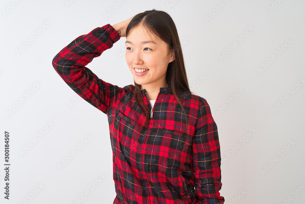 Young chinese woman wearing casual jacket standing over isolated white background smiling confident touching hair with hand up gesture, posing attractive and fashionable Young chinese woman wearing casual jacket standing over isolated white background smiling confident touching hair with hand up gesture, posing attractive and fashionable