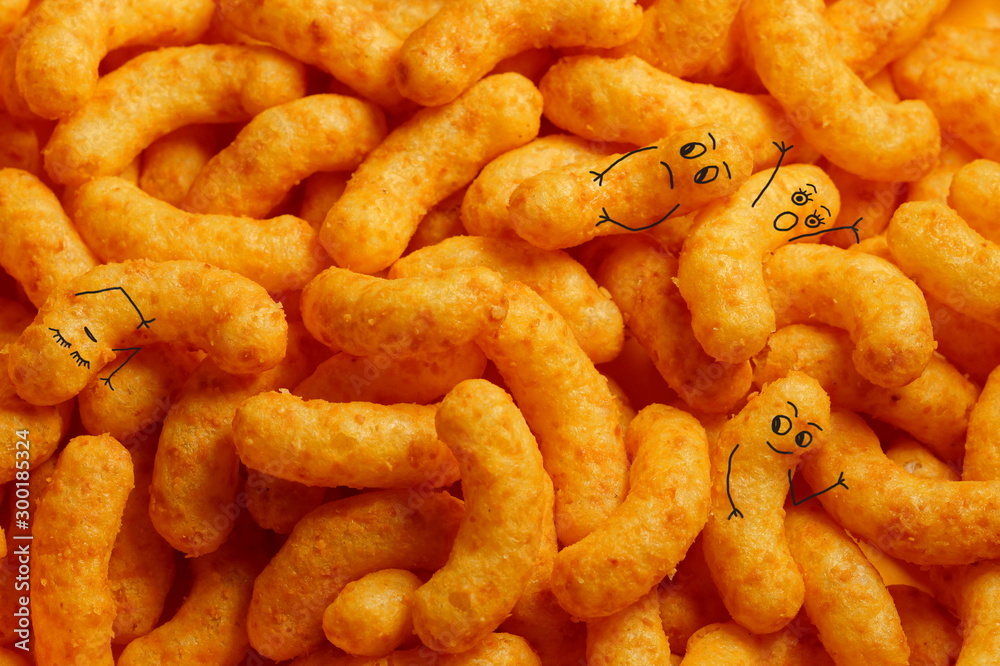 funny smiling peanut flip background, detailed close-up of peanut Puffs. Full frame of peanut curls funny smiling peanut flip background, detailed close-up of peanut Puffs. Full frame of peanut curls