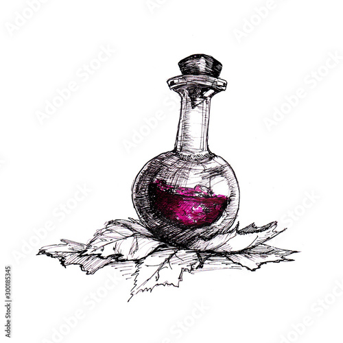 Red potion bottle on leaves