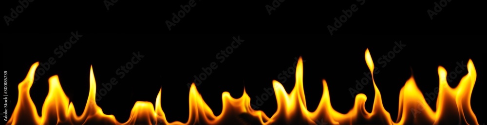 Close-up flames of an alcohol burner on a dark background Close-up flames of an alcohol burner on a dark background