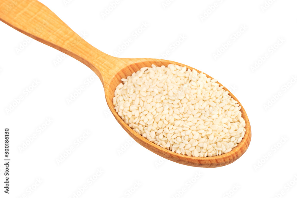 Sesame seeds in spoon Sesame seeds in spoon