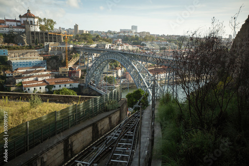 View of Dom Luis I bridge over Douro river, Porto^ Portugal.