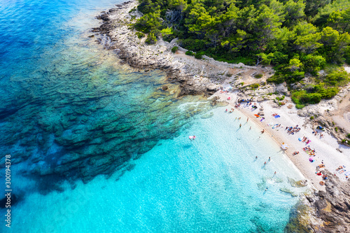 Aerial view on the beach and azure sea. Beach and sea from air. Place for resting. Summer seascape from drone. Croatia landscape. Travel - image