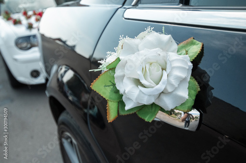 Wedding decoration on cars. The concept of marriage, family relationships, wedding paraphernalia.